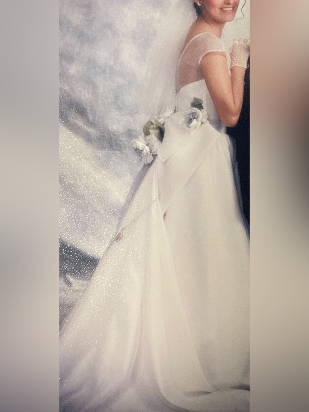 Elegant White Bridal Gown with large Bow and Floral Waist Detail
